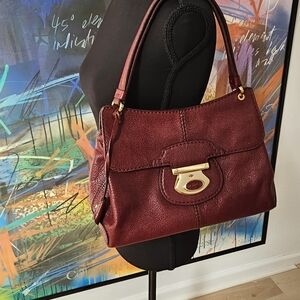 Tod's Red Shoulder Bag with Gold Clasp and Textured Leather